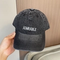 Close-up of ADMRABLE embroidery on vintage washed denim baseball cap with distressed texture - Adjustable 56-60cm / Black with ADMIRABLE Embroidery