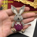 Exquisite rabbit brooch with pink and clear crystals on a gold base, 34mm by 66mm size - Rabbit Brooch / Rose Red