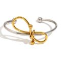 Bracciale rigido a nodo in acciaio inossidabile placcato oro 18K con terminali a sfera - Bicolore