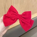 Red velvet hair clip with sparkling sequins shown in hand for festive wedding events - Spring Clips / 16cm / Sparkling Red