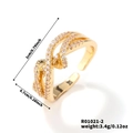 Golden multi-layer crisscross ring with micro-pave cubic zirconia and adjustable opening - Multi-layer Cross