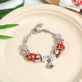 Christmas charm bracelet with red beads and snowflake pendants on a ceramic tray - Snowflake Bell Silver Red (Style 4) / 20cm