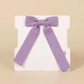 Purple corduroy hair bow clip with gold polka dots for girls displayed on white card - Purple