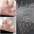 Sparkling rhinestone nail art stickers with colorful gemstones and silver metallic bases - Luxury Silver Foil Rhinestone Style (CO-415 Silver)