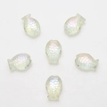 Macro shot of 6 iridescent fish-shaped crystal beads with textured scales for DIY jewelry - Crystal Yellow