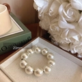 Elegant large 20mm cream pearl hair tie used as a minimalist bracelet accessory - Large (20mm Pearls)