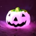 Halloween pumpkin night light in white plastic with glowing pink purple LED illumination - Pink Pumpkin
