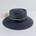 Close-up of a charcoal straw boater hat featuring a gold T-logo and glitter accents - M (56-58cm) Adjustable / Black