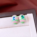 Close-up of luxury oval earrings with green and pink stripes and crystal accents - Oval Green & Pink Stripes with Blue Beads (Silver Needle)