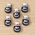 Cartoon Halloween pumpkin ghost pendants in black finish with white top hats on wood background - Hannya Mask