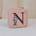 Pink PU leather travel jewelry case with floral letter N print and zipper closure - Print N