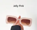 Detail of jelly pink rectangular sunglasses with thick frames and gradient tinted lenses - Jelly Pink