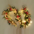 Close-up of Christmas garland with pine needles, red ornaments, gold leaves, and LED lights - T678/180 Garland (With Lights)