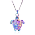 Macro detail of iridescent stainless steel sea turtle pendant with starfish relief - Pendant Necklace / AB Color