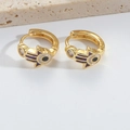 Golden Hamsa Hand and Evil Eye hoop earrings with purple enamel and clear zircons - Purple