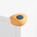 L-shaped orange silicone corner guard with blue accent for child safety on furniture - Shell Dual Color-Orange