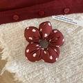 Sweet red floral fabric scrunchie with white heart prints on a soft beige knit background - Red with White Heart