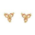 Dettaglio degli orecchini a lobo a trifoglio color oro champagne con tre zirconi - Oro 18K / Champagne