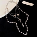 Detail of multi-layered silver necklace with pearls, cross and virgin mary medal charm - Silver (4-Piece Set)