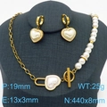 Gold heart pearl jewelry set with rhinestone earrings and necklace on a model - Gold Heart Pearl Jewelry Set