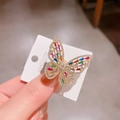 Sparkling butterfly open ring in gold finish with vibrant multi-colored gemstones - Gold + Multi-color