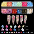 Detail of 3mm and 6mm 3D resin flower nail charms and metal beads in a 12-slot storage box - Colored Five-Petal Flower (12TZ-03)
