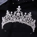Close-up of sparkling bridal tiara with silver filigree and teardrop zircon crystals - Thick Silver White Zircon