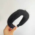 Detail shot of the wide black plush cross-knot headband with soft faux fur texture - Braided / Black
