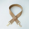 Detail of adjustable khaki cotton bag strap with polished gold-tone metal buckles - Khaki