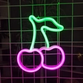Pink and green cherry-shaped LED neon sign hanging on a white wall grid display - Pink / Battery and USB Dual Use