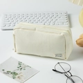 Creamy white canvas pencil case with zipper and aesthetic stationery on a desk - Off White