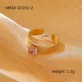 Verstelbare 18k vergulde ring met roze zirkoon en meerlaagse getextureerde band - Eén maat / Goud met roze zirconia