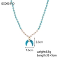 Detail view of bohemian necklace with blue stone beads and golden moon pendant - Crescent Pendant Turquoise Style (GX00341D)