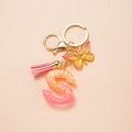 Pink glitter resin letter S keychain with gold butterfly and tassel accessories - Letter S