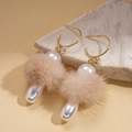 Detail of C-shaped drop earrings featuring fur pom-poms, pearls and crystal accents - Brown