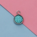 Top view of 12mm stainless steel pendant tray with sky blue resin inlay on pink blue background - Sky Blue Crushed Stone Style (25)