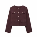 Close-up of wine red tweed jacket with gold metal buttons and four flap pockets - Burgundy