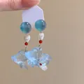 Silver 925 fish drop earrings with blue translucent body and white heart bead - Goldfish Style (HE27027HE27320)
