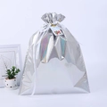 Detailed view of silver laser drawstring gift bag with metallic grid texture and ribbon - Laser Silver 58*43