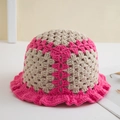 Detail of handmade crochet knit bucket hat showing beige and pink ruffle wavy edge texture - One Size / Beige & Pink