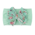 Dettaglio della fascia per neonati in nylon a coste verde menta con fiocco floreale - Verde Menta