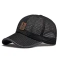 Full mesh black baseball cap with breathable fabric and a brown leather patch - Adjustable / Black