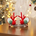 Christmas hair clip with red reindeer antlers, felt ears and festive plush pom-poms - Red & Green Antlers