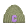 Detailed knit texture of green beanie with purple embroidered letter C patch on cuff - Green & Purple