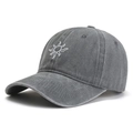 Washed grey cotton baseball cap with white sun embroidery and curved brim in 45-degree view - Adjustable / Gray