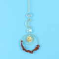 Detailed suncatcher with golden crescent moon, sun face and red raw crystal stones - Red Jasper
