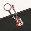 Guitar keychain in red and white enamel finish with rhinestones and cat eye stones - Red Beaded Rhinestone Guitar
