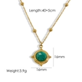 Franse vintage 14K goud-titaanstalen ketting met een ronde groene natuurstenen hanger - Amazoniet