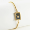 Golden 18k box chain bracelet with black enamel rectangular pendant featuring letter W - W-Black
