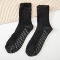 Chaussettes douces en polaire corail noire avec picots antidérapants pour la maison - Taille unique / Noir